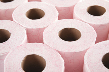 Many rolls of toilet paper as background