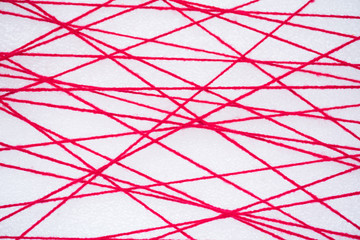abstract web line connection of complex and heap red color yarn  on white background , networking concept