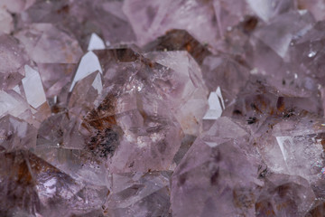 Macro shot of Amethyst natural crystal cluster with Goethite inclusions from Brazil like art background