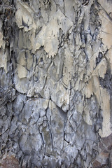 Texture of a mountain gray-blue rock wall
