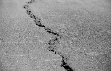 cracked asphalt after earthquake