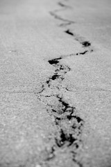 cracked asphalt after earthquake