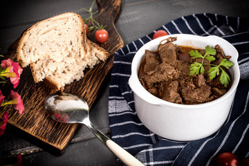 Beef meat stew in ceramic pot.