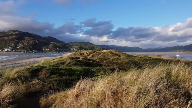 Fairbourne sand dunes looking out towards Barmouth in Wales, UK.