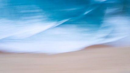 Fototapeta na wymiar Motion blurred background of Nature scene tropical beach and blue sky