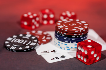 Casino abstract photo. Poker game on red background.
