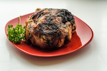grilled chicken on a red plate