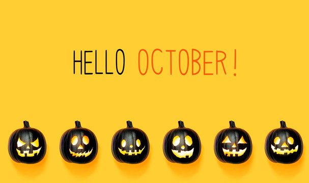 Hello October with black colored pumpkin lanterns