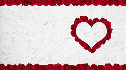 Obraz premium Frame made of red roses on plaster wall.