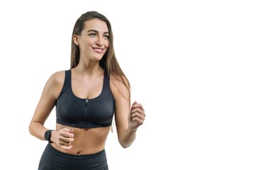 Fototapeta na wymiar Young woman runner in black sportswear, isolated on white background, copy space