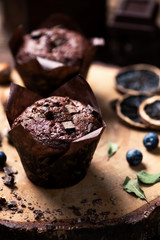 Muffins on wooden table