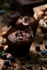 Muffins on wooden table