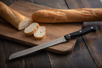 french baguette and bread knife