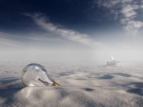 Surreal Bulb with candle scene in snow background