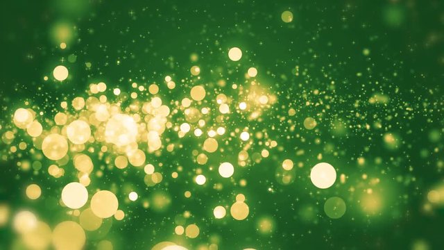 Green light shine particles bokeh, holiday concept. Christmas animated gold background with circles and stars. Space background. Screen green. Seamless loop.