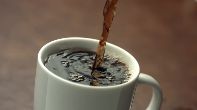 Loop of Coffee pouring, slow motion
