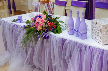 The restaurant is decorated with wedding decor, Banquet hall . The table of the bride and groom