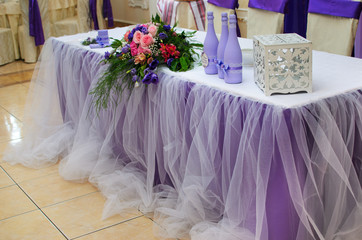 The restaurant is decorated with wedding decor, Banquet hall . The table of the bride and groom