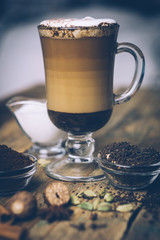 SPICE DIRTY CHAI LATTE. Masala chai and espresso. Autumn or winter warm spice coffee drink