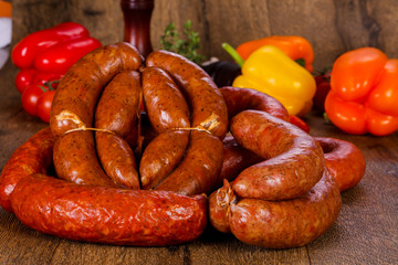 Pork sausages over wooden