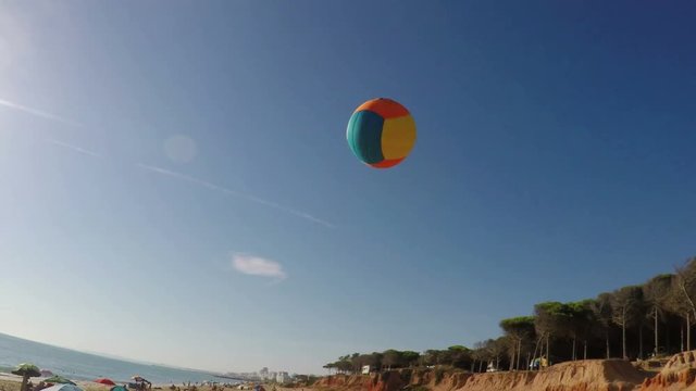 Father Plays Beach Volleyball With His Daughter. Shooting From The First Person.