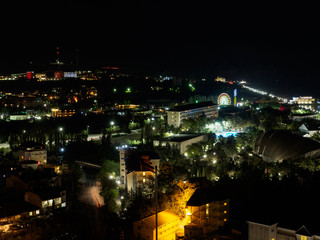 Fototapeta na wymiar Nightlight city view from the big hill