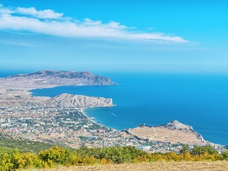 Summer view of Genoese fortress in Sudak city and Sudak bay