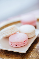 Multicolored macaroon on a plate