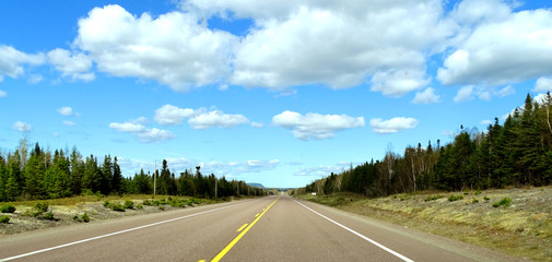 Fototapeta premium open highway and blue sky with clouds
