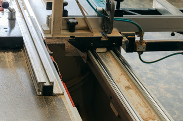Production of cabinet furniture, cutting parts on a format machine
