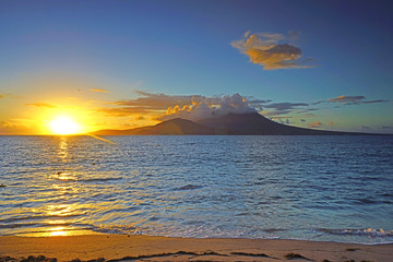 Night view of the Nevis Peak volcano across the Caribbean Sea from St Kitts