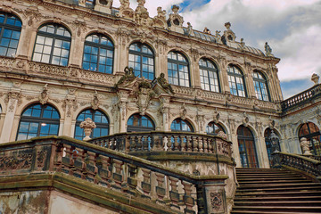 Fototapeta na wymiar Facade of the Zwinger Pavion (Der Dresdner Zwinger, 17 century). Zwinger is built in Rococo style in Dresden, Germany