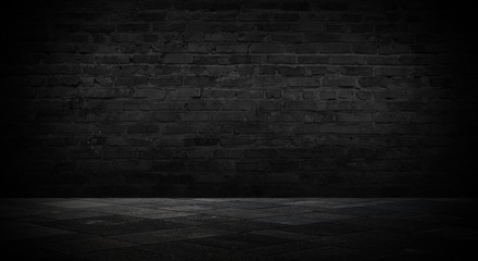 background of an empty black room, a cellar, lit by a searchlight. Brick black wall, smoke.