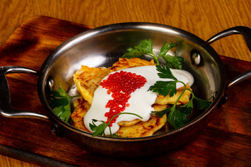 Potato pancake with caviar