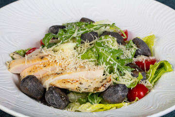 Fototapeta na wymiar Caesar salad with chicken
