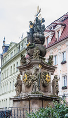 Fototapeta na wymiar Holy Trinity column - monument by sculptor Oswald Josef Wenda in the historical centre of Karlovy Vary