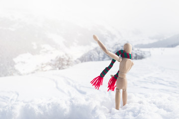 Figure of the person in snow with the raised hand