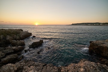 Coast of Santa Maria al Bagno at sunset in Salento - Italy
