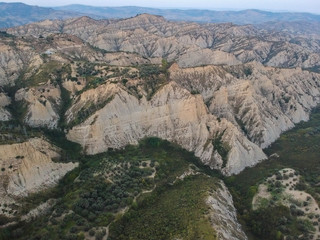 view of Aliano, a town in the province of Matera, in the Southern Italian region of Basilicata, Italy. Famous for the typical calanchi landscape. Aerial view