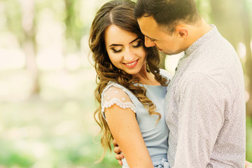 Naklejka premium a gentle hug of a couple in love who are very happy and enjoy each other