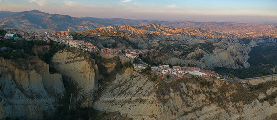 view of Aliano, a town in the province of Matera, in the Southern Italian region of Basilicata, Italy. Famous for the typical calanchi landscape. Aerial view