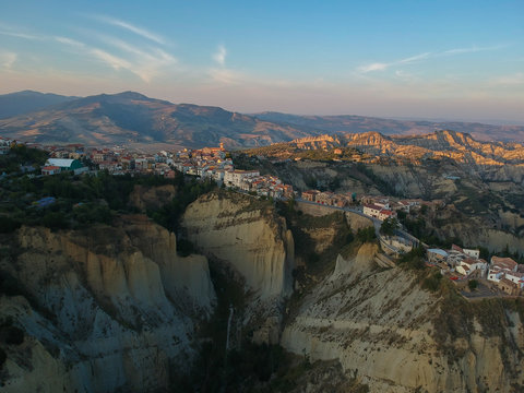 view of Aliano, a town in the province of Matera, in the Southern Italian region of Basilicata, Italy. Famous for the typical calanchi landscape. Aerial view