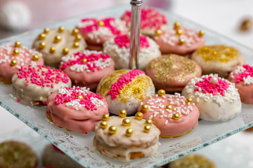 A range of beautifully decorated cakes in plate