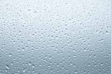 Water droplets texture on the transparent window background