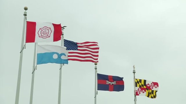 Maryland and American Flags waving at beach