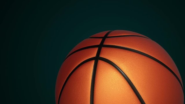 Animation of slow rotation ball for basketball game. View of close-up with realistic texture and light. Animation of seamless loop.