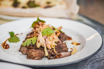 Vkusnoe, delicious hot dish of meat with vegetables and spices