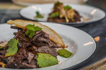 Vkusnoe, delicious hot dish of meat with vegetables and spices