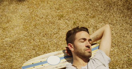 Hispanic sleeping napping outdoors