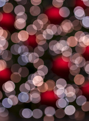 red ornament bokeh background christmas tree